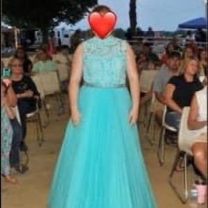 Size 18 Sherri Hill 
Alterations have been made. It is used so there are flaws